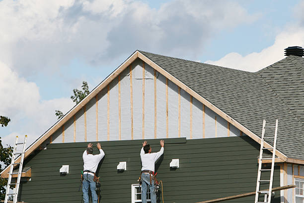 Professional Emergency Siding Repair technician working in Lawrenceburg, TN